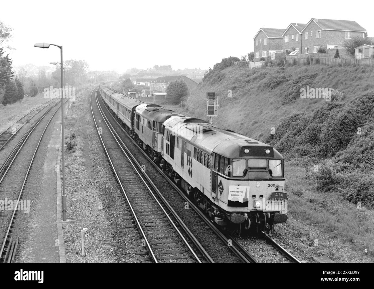 A pair of Class 31 diesel locomotives numbers 31200 and 31145 working an enthusiast railtour approaching Weymouth on the 14th May 1994. Stock Photo