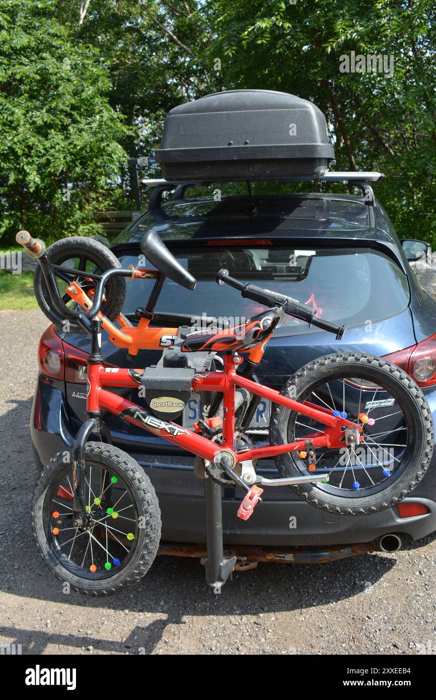 Electric bike on the back of SUV Stock Photo