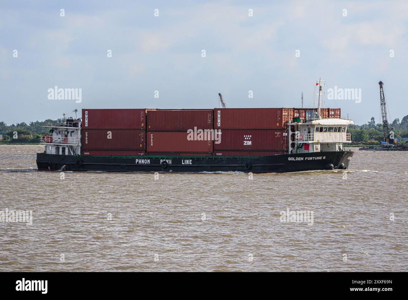 Mekong River, Vietnam/Cambodia. Aug 24,2024: Vietnamese container ship ...
