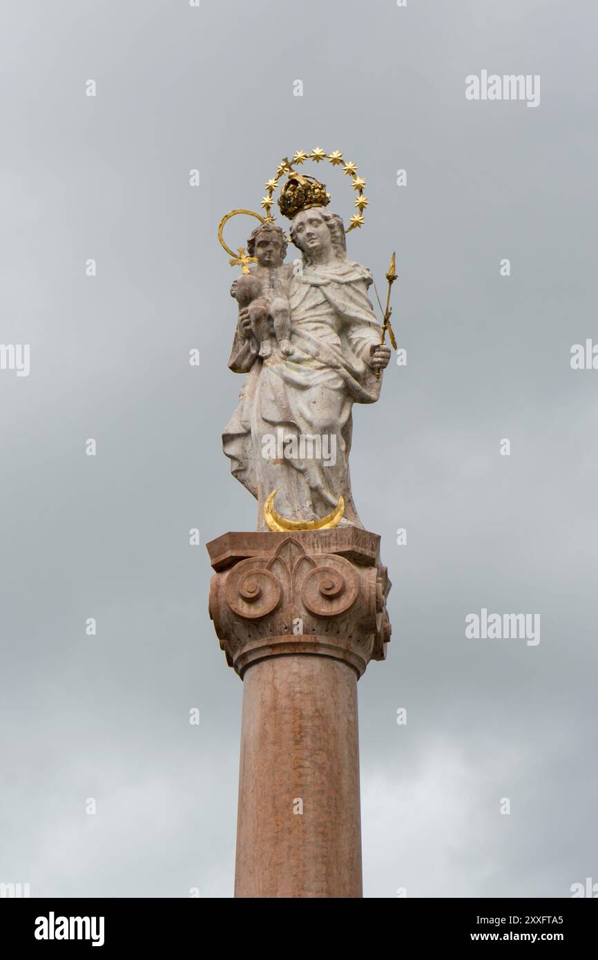 Column with Marian sculpture in Murnau, Bavaria, Germany Stock Photo