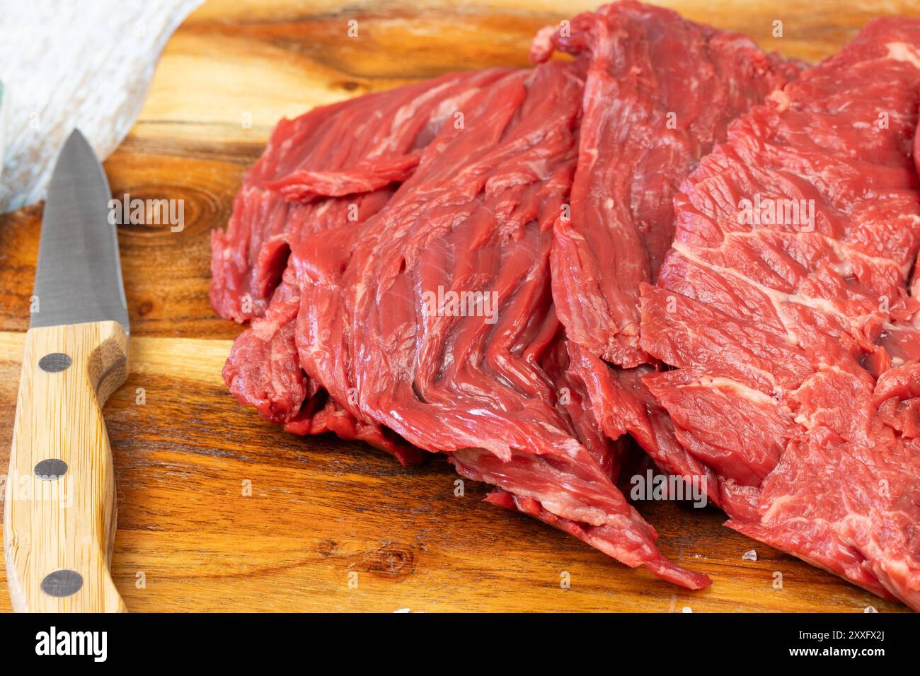 Raw beef steaks, close-up, on a cutting board Stock Photo