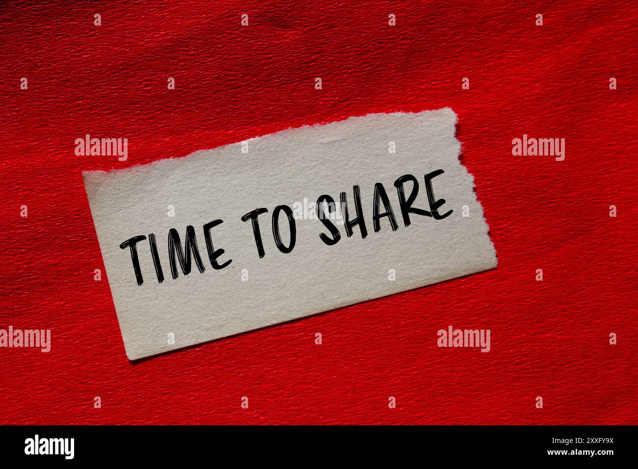 Time to share message written on ripped torn paper piece with red ...