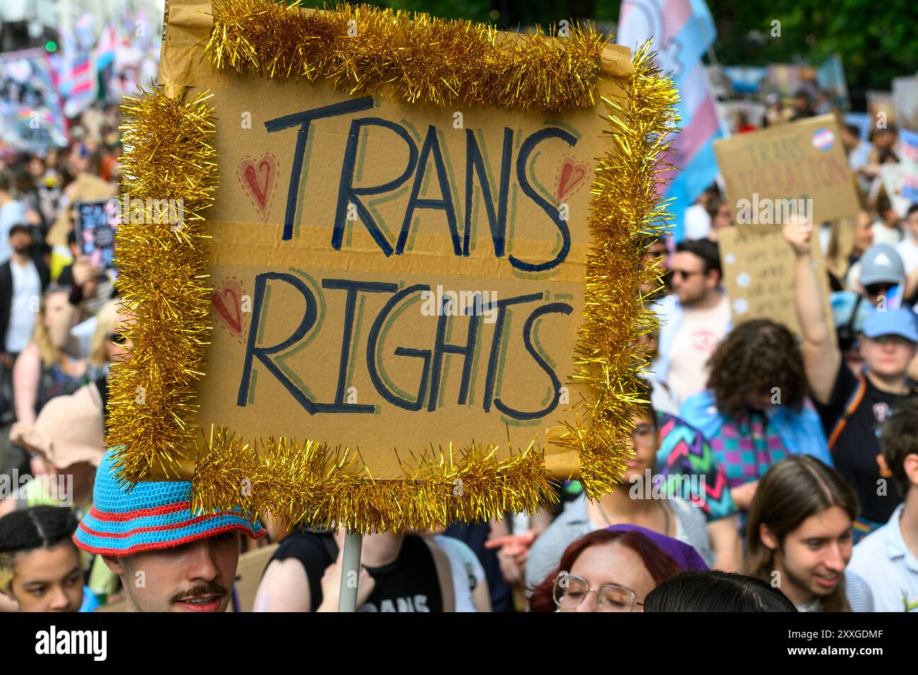 Marchers on the London Trans+ Pride march advocating for greater ...