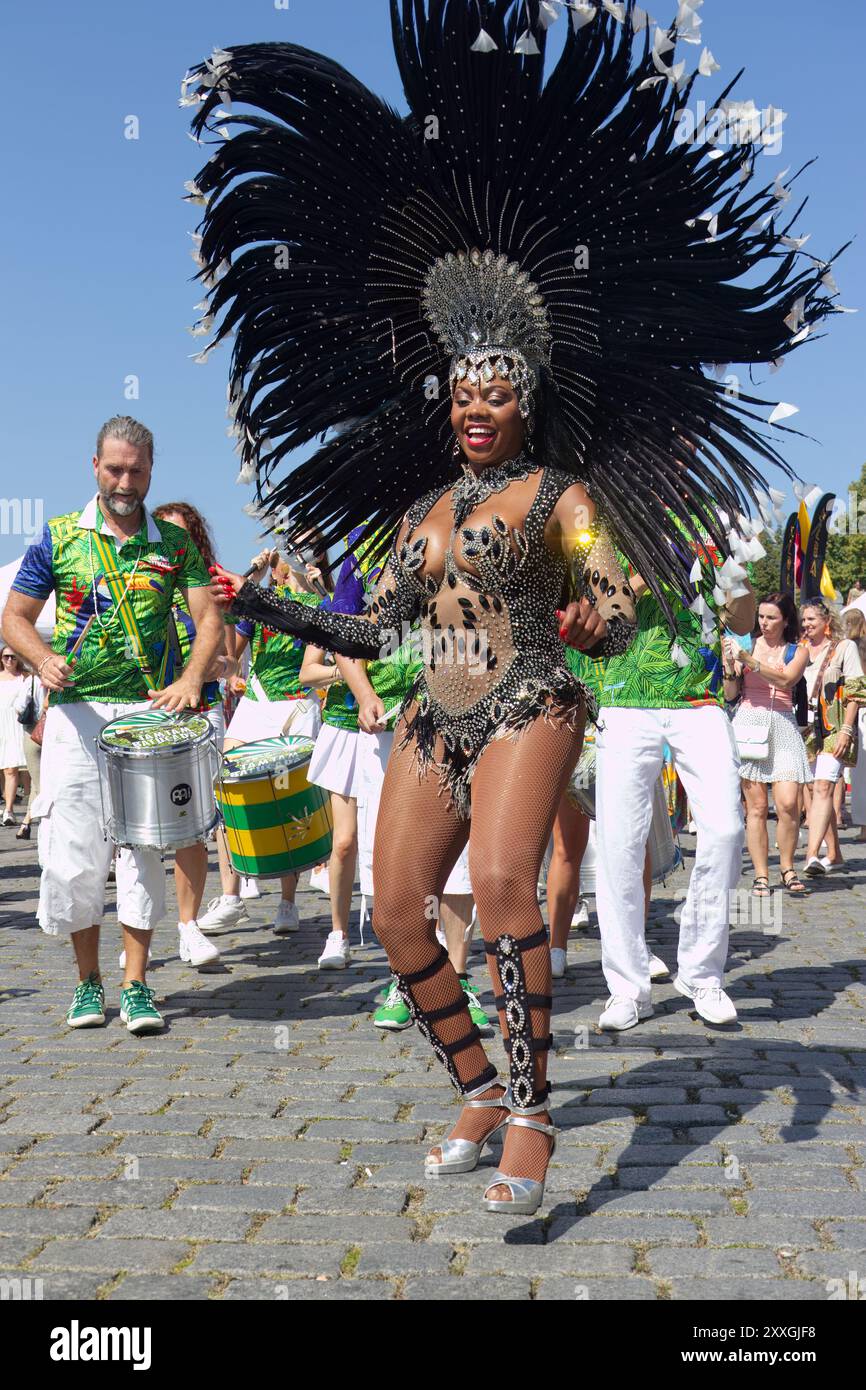 Viviane Mateus, Vibrasil Samba dancer and Tam Tam Batucada musicians at the Merkado Latino-American Festival on the Naplavkat on August 24, 2024 in Pr Stock Photo