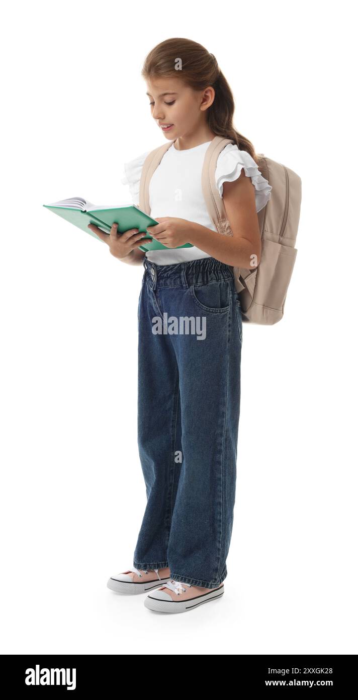Girl with backpack and book on white background Stock Photo - Alamy