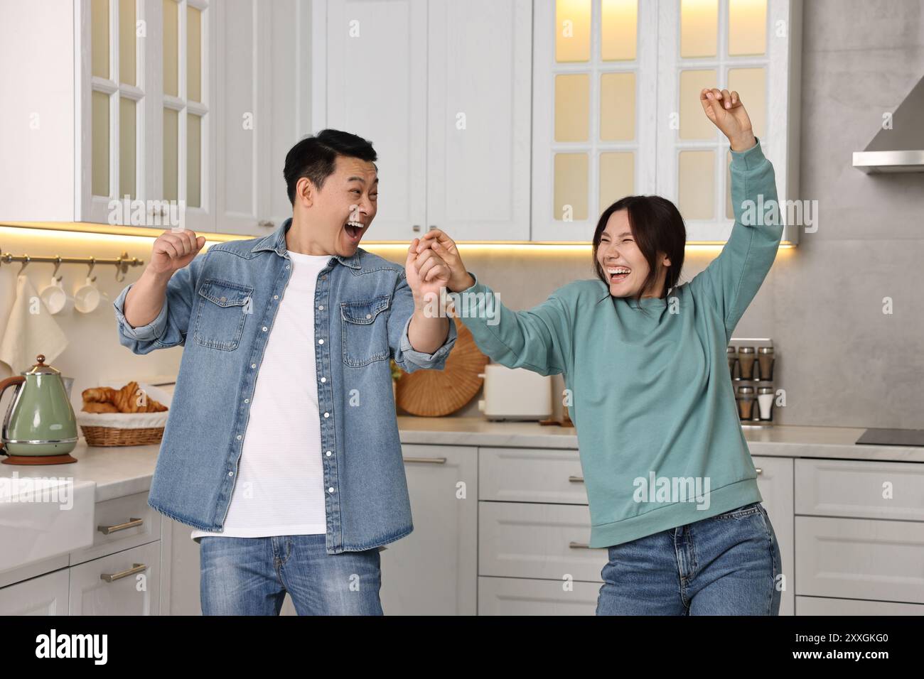 Lovely asian woman happy dancing hi-res stock photography and images ...