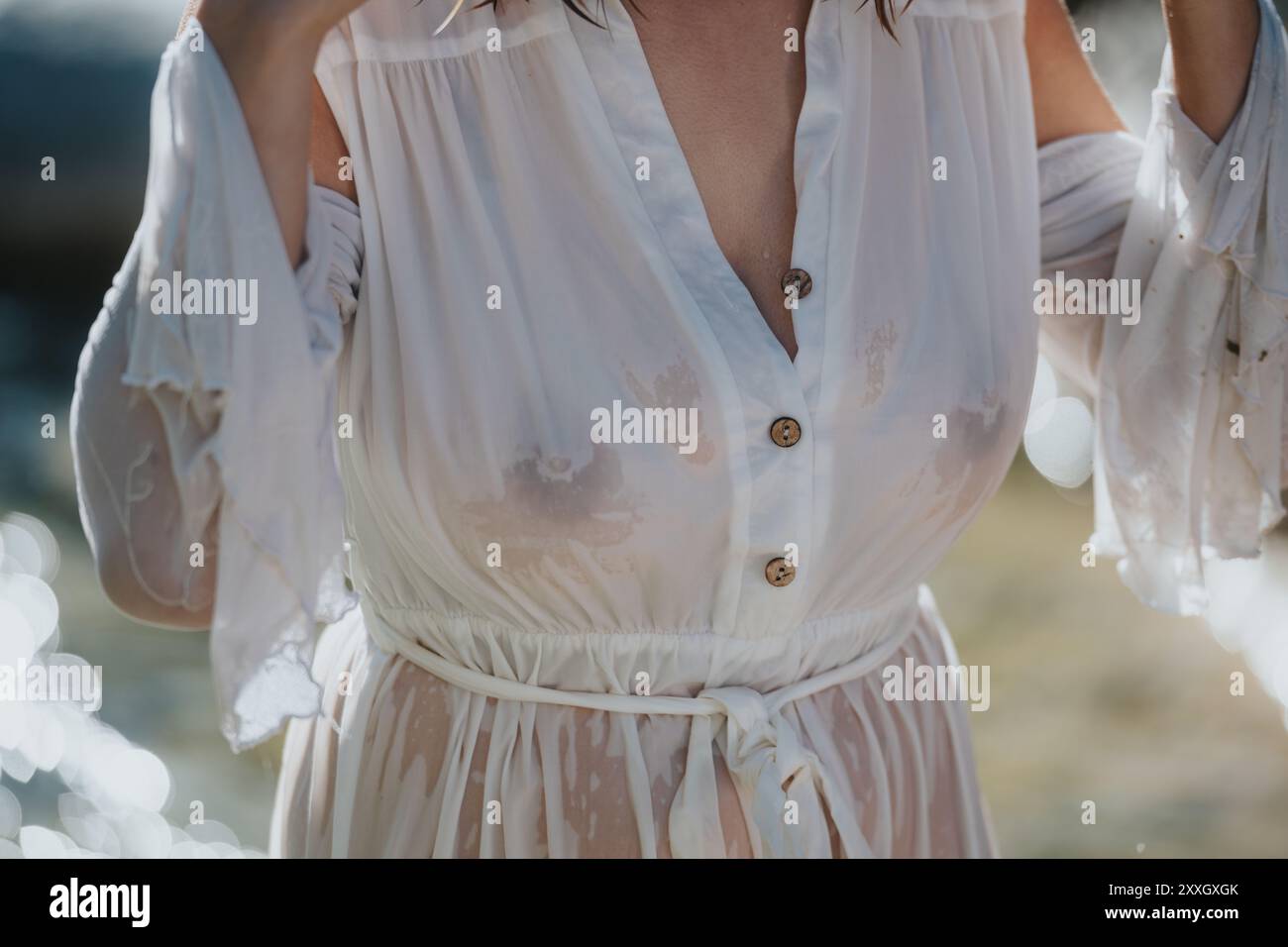 Translucent Woman Belted dress hi-res stock photography and images - Alamy