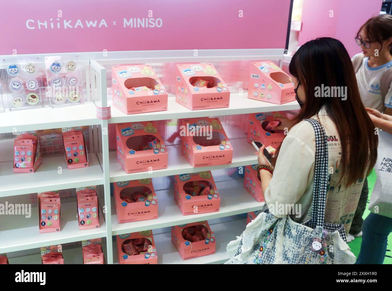SHANGHAI, CHINA - AUGUST 22, 2024 - Visitors shop for authentic derivative products at chiikawaÁminiso's pop-up shop in Shanghai, China, August 22, 20 Stock Photo