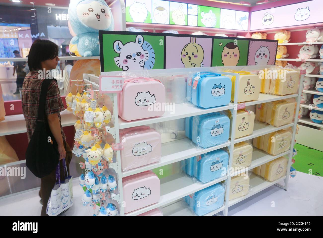 SHANGHAI, CHINA - AUGUST 22, 2024 - Visitors shop for authentic derivative products at chiikawaÁminiso's pop-up shop in Shanghai, China, August 22, 20 Stock Photo