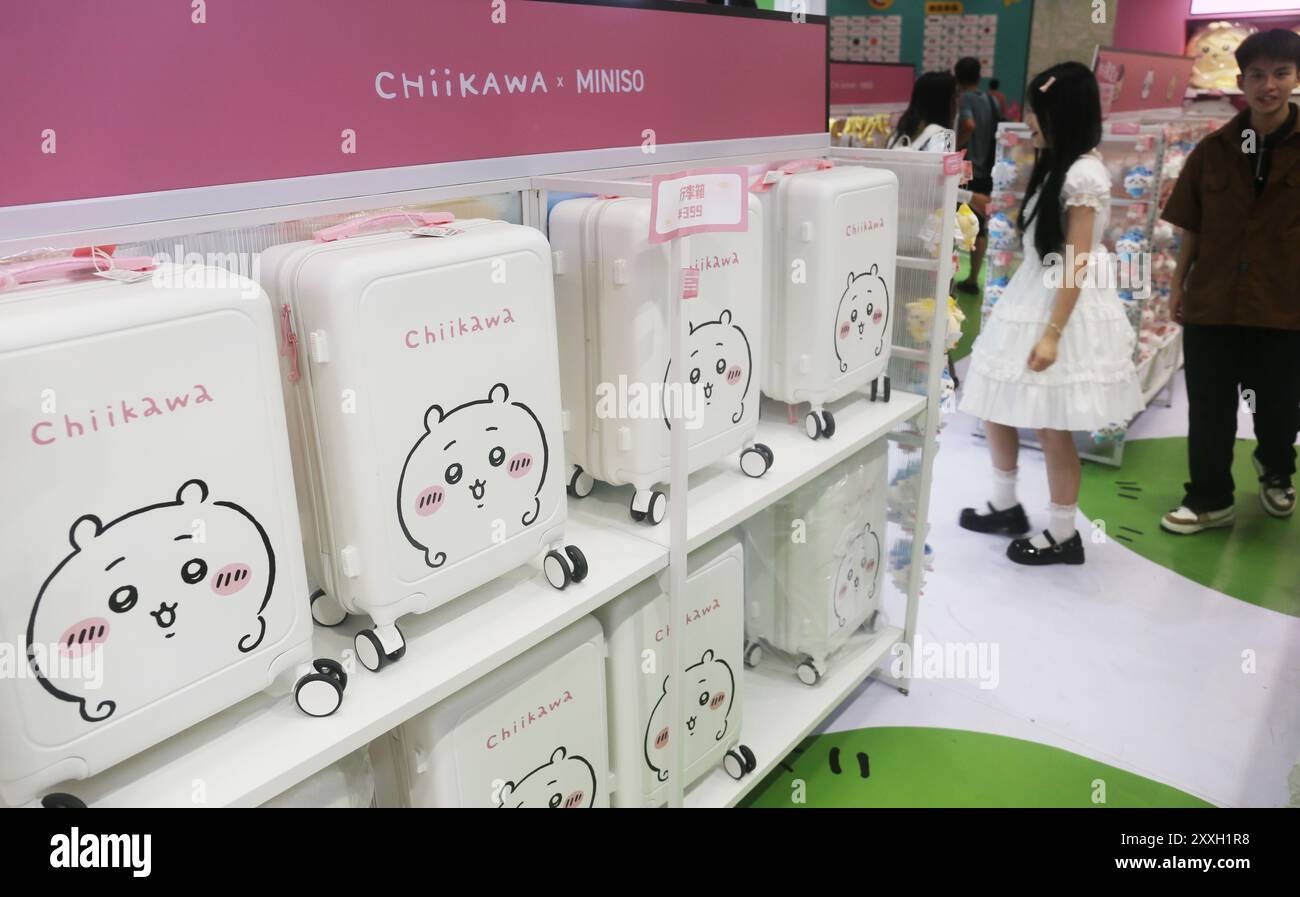 SHANGHAI, CHINA - AUGUST 22, 2024 - Visitors shop for authentic derivative products at chiikawaÁminiso's pop-up shop in Shanghai, China, August 22, 20 Stock Photo