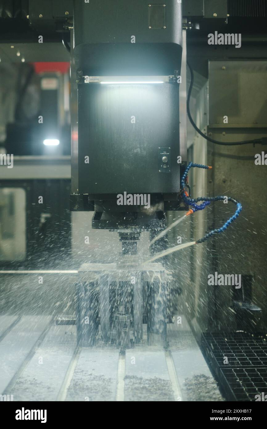 Using a CNC machine for precision milling in an industrial environment ...