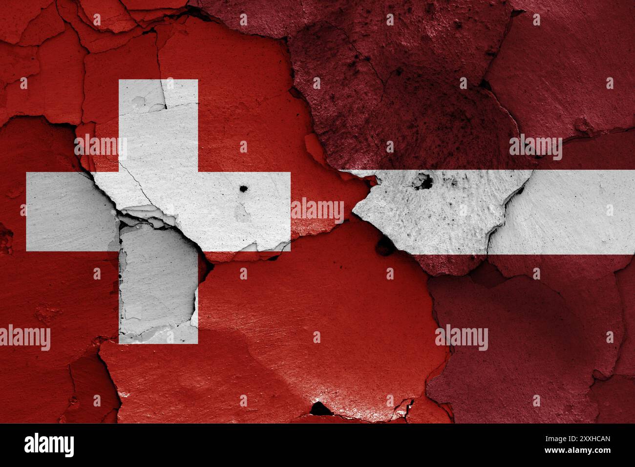 Flags of Switzerland and Latvia painted on cracked wall Stock Photo - Alamy