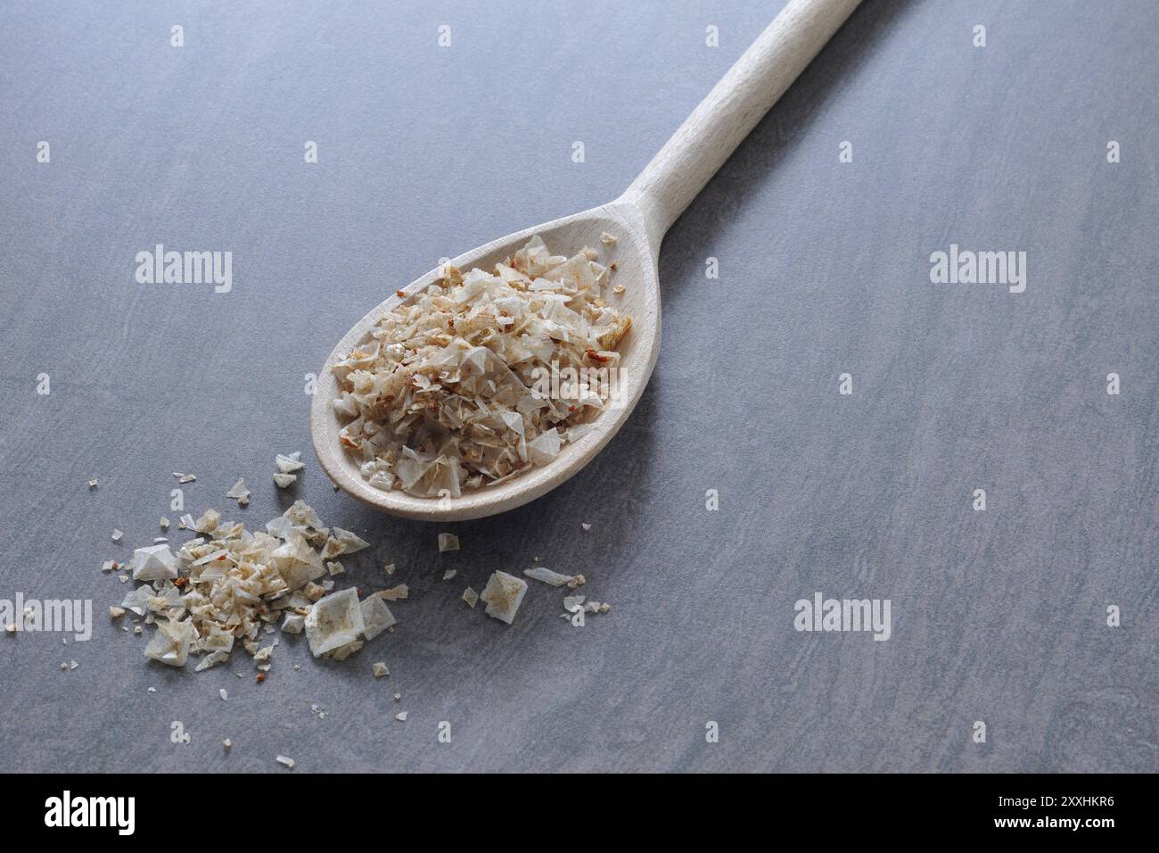 Pyramid salt with a wooden spoon Stock Photo