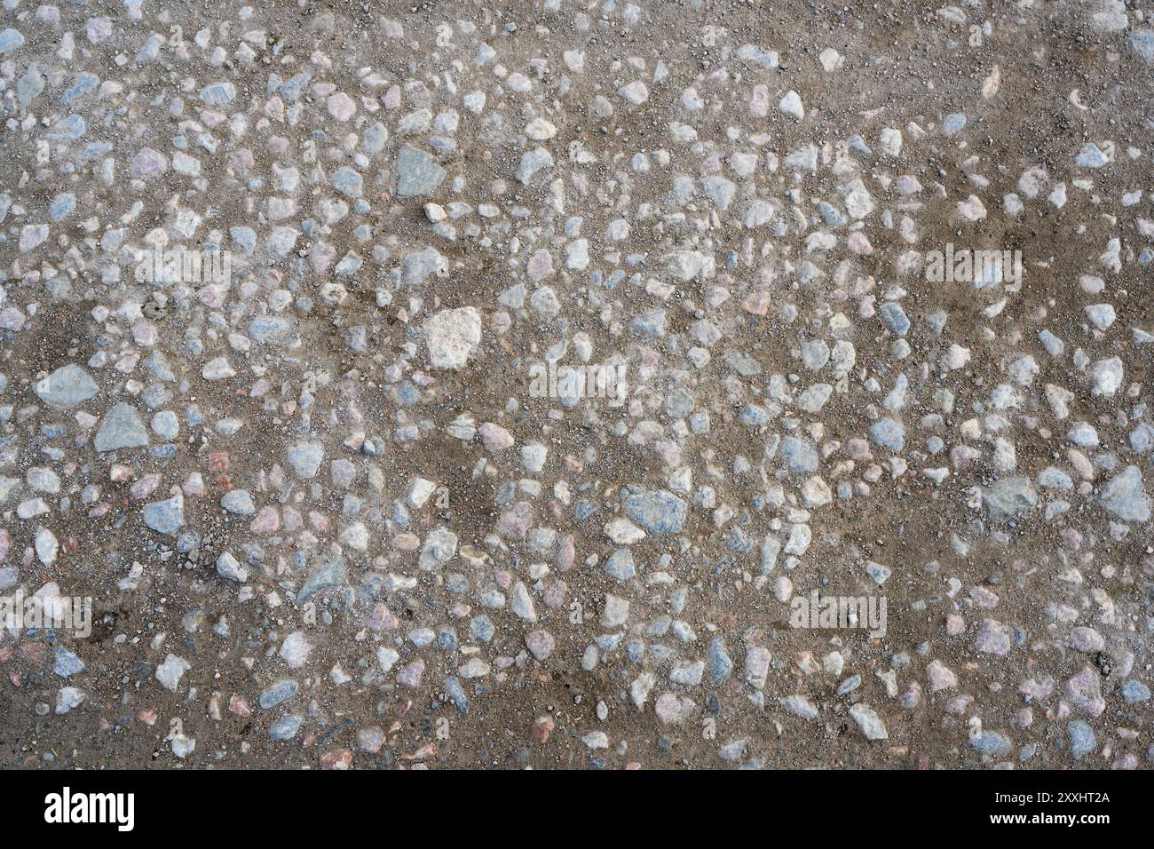 Top and close view of the small stones of the paved dirt road Stock ...