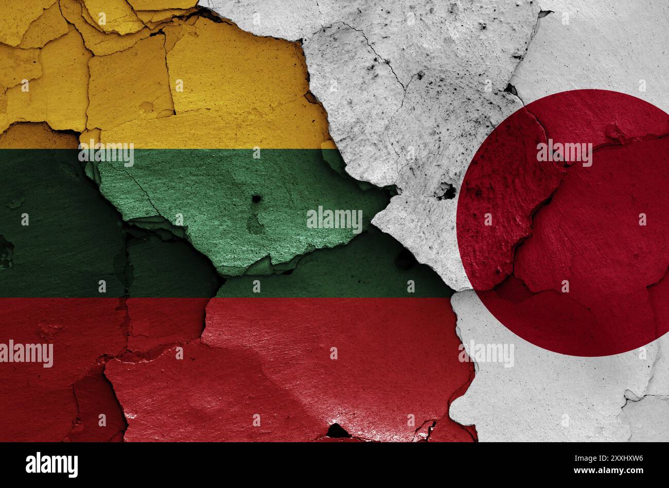 Flags of Lithuania and Japan painted on cracked wall Stock Photo