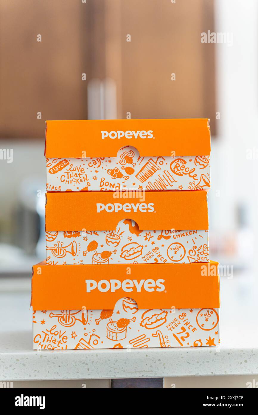 August 18 2024 - Calgary Alberta Canada - Family packs for Popeyes meal Stock Photo