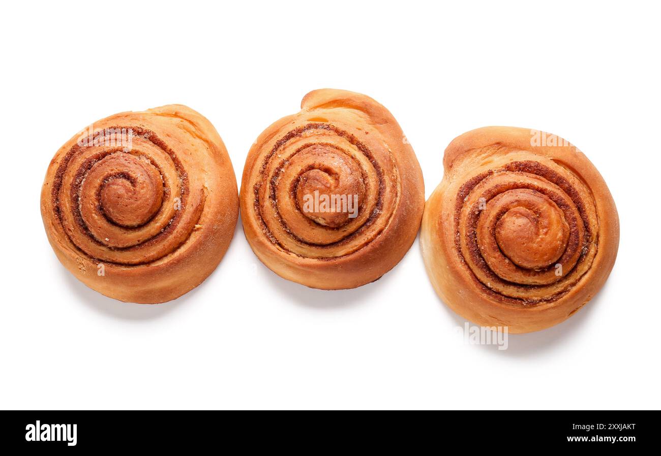 Sweet cinnamon rolls on white background Stock Photo - Alamy