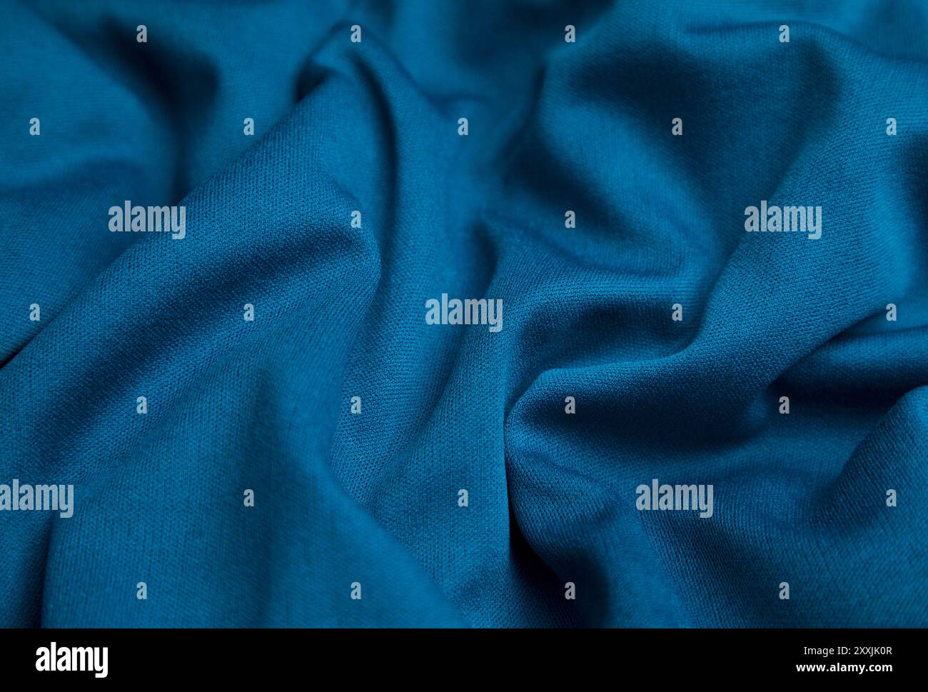 Blue fabric background. Selective focus. Stock Photo