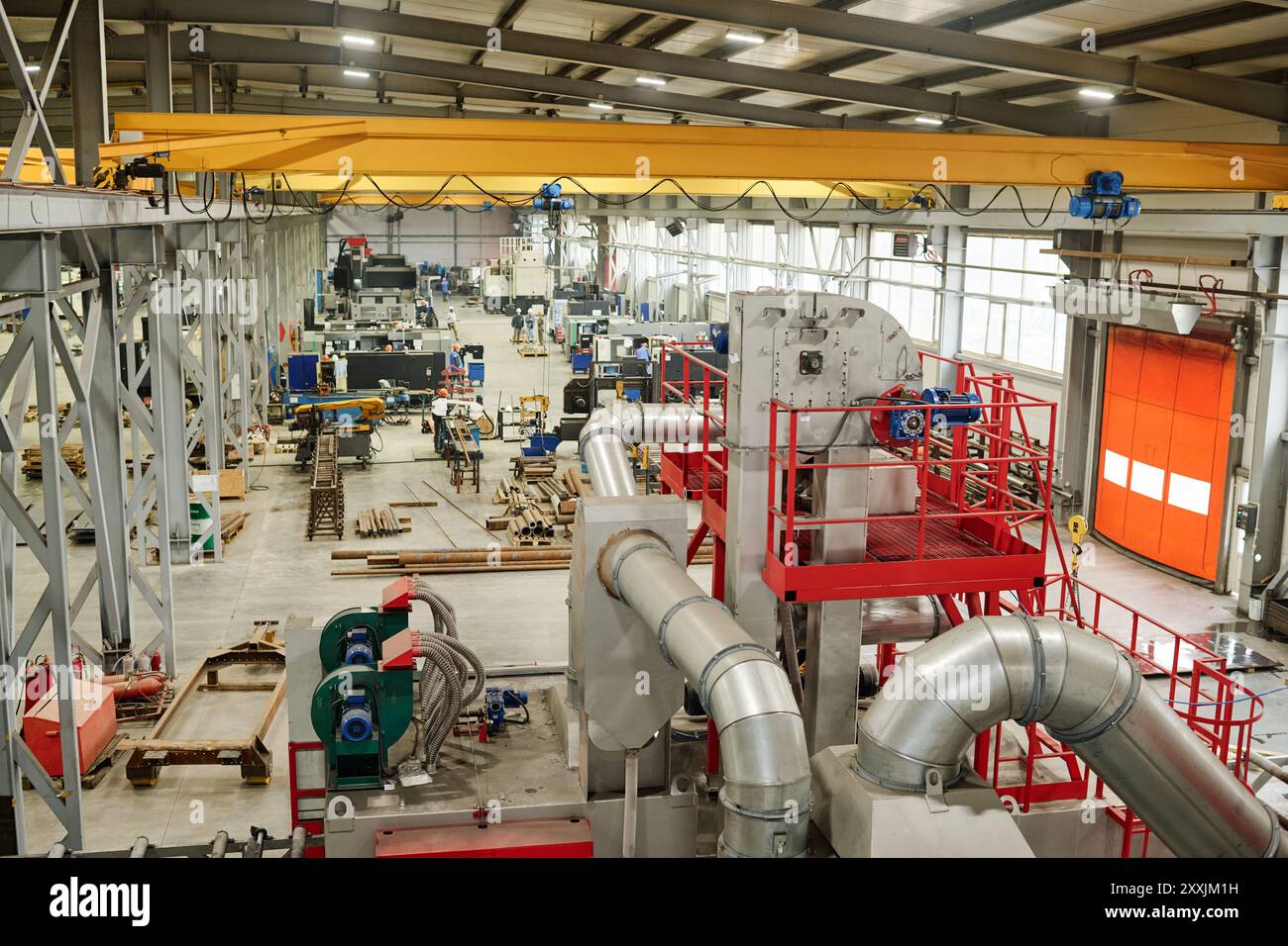 Wide angle View Of Large Manufacturing Plant Filled With Various Heavy 