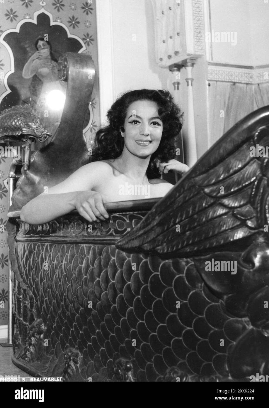 MARIA FELIX in an exotic bathtub in a scene from FRENCH CANCAN 1955