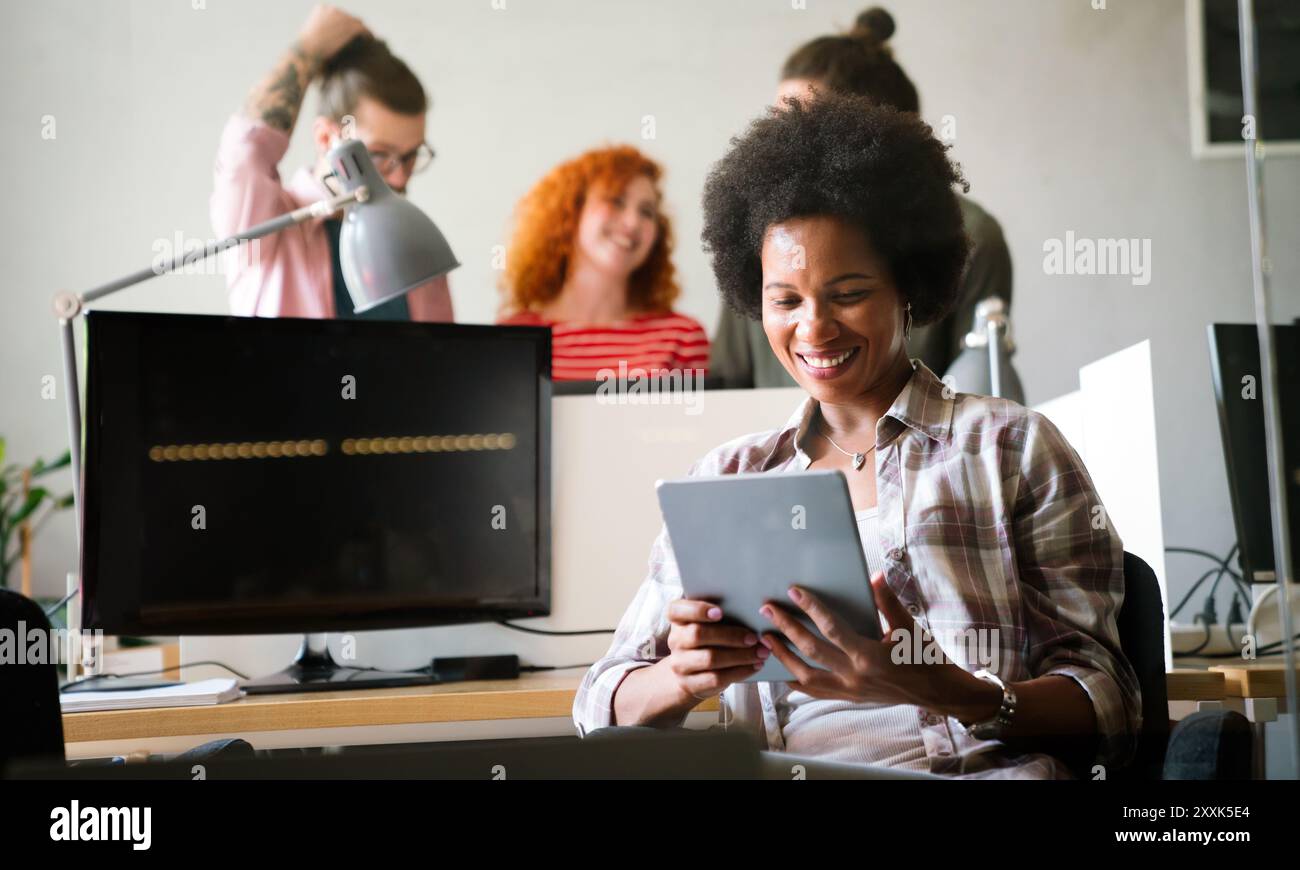 Software engineers working on project and programming in company. Startup business concept Stock Photo