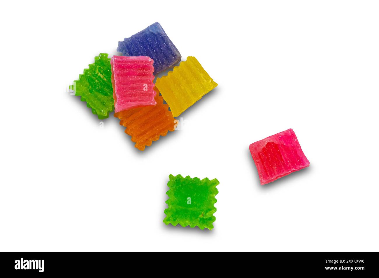 Crispy jelly. Top view of sweet colorful cube shape crispy jelly isolated on white background with clipping path. Stock Photo