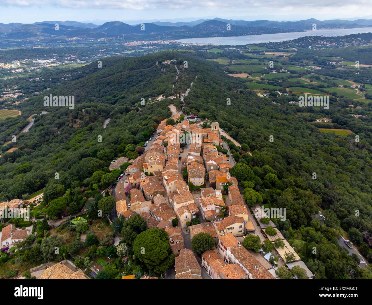 aerial-view-on-green-hills-pine-trees-and-oaks-houses-gulf-of-saint