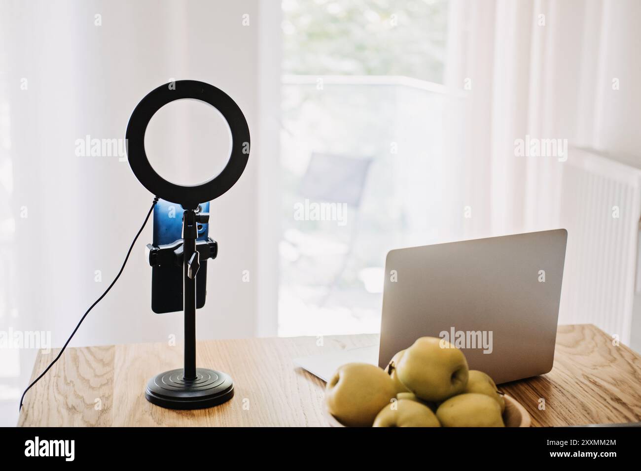 Home video recording setup with laptop and ring light, content creation ...