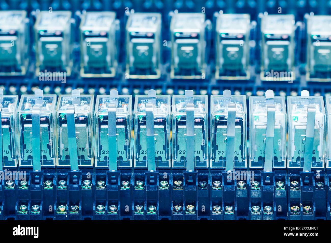 Close up Relay actuators inside the Industrial power case Stock Photo
