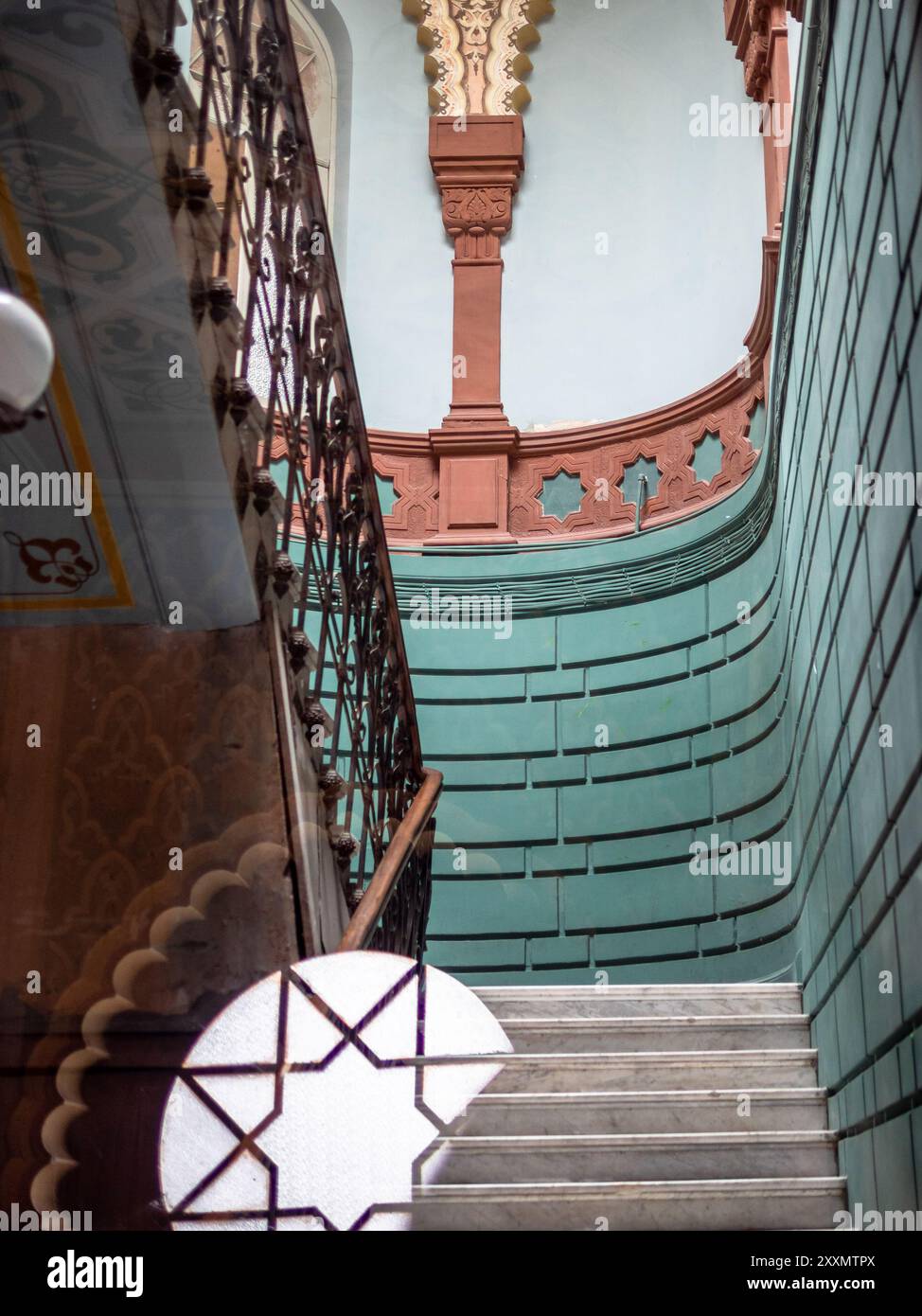Tbilisi, Georgia - July 28, 2024: decorated staircase in entrance of old residential building in Tbilisi city on summer day, Georgia (Mansion of the m Stock Photo