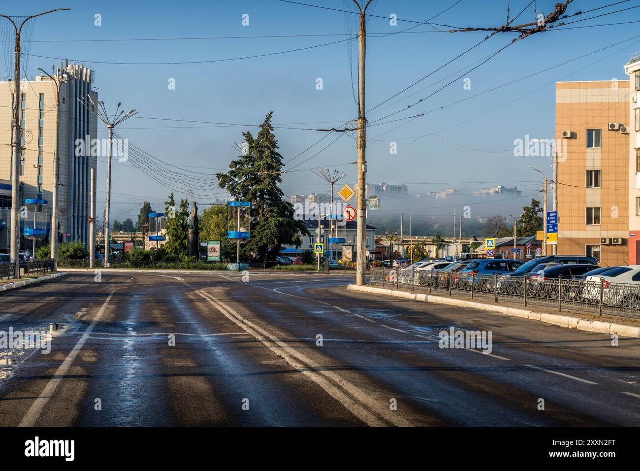 The empty road during the foggy morning in Belgorod, a large Russian city close by Ukrainian city Kharkiv. Stock Photo