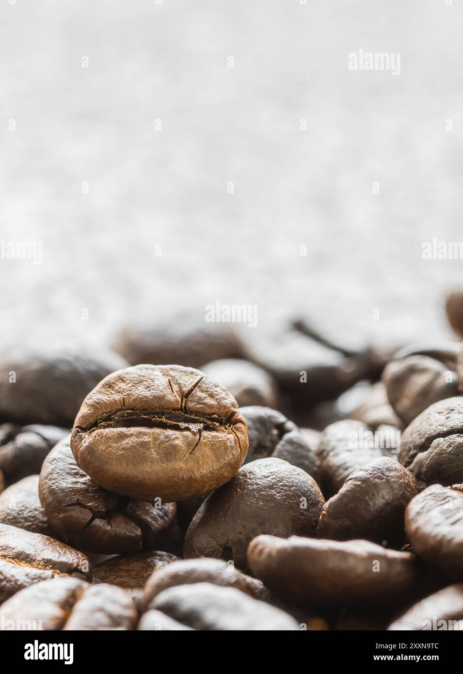 Close up heap of roasted brown coffee beans Stock Photo - Alamy
