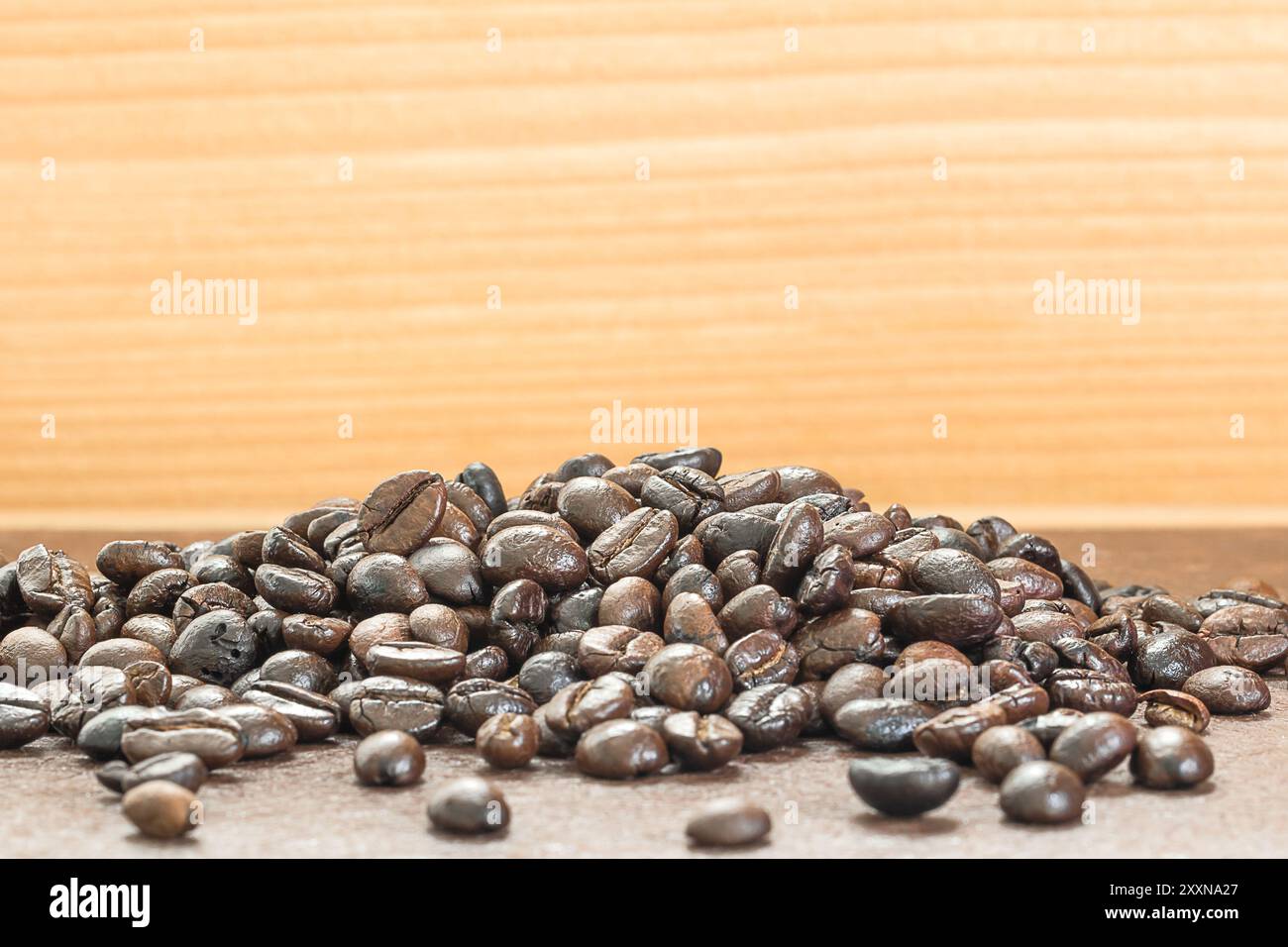 Close up heap of roasted brown coffee beans. coffee beans background ...