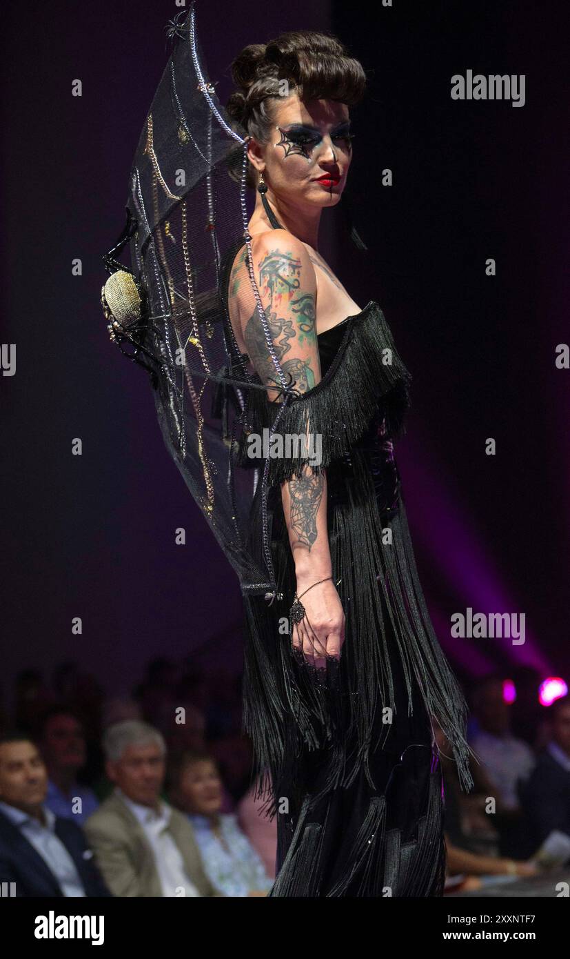 Dunedin, Florida, USA. 24th Aug, 2024. Models walk the runway