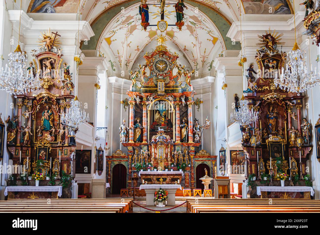 Chancel and altar of Pfarrkirche St. Leonhard (parish church of St Leonard) in Mittersill, a village in the Pinzgau region of the Alps, Austria Stock Photo