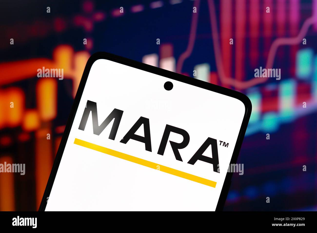 In this photo illustration, the Marathon Digital Holdings (MARA) logo is  displayed on a smartphone screen Stock Photo - Alamy