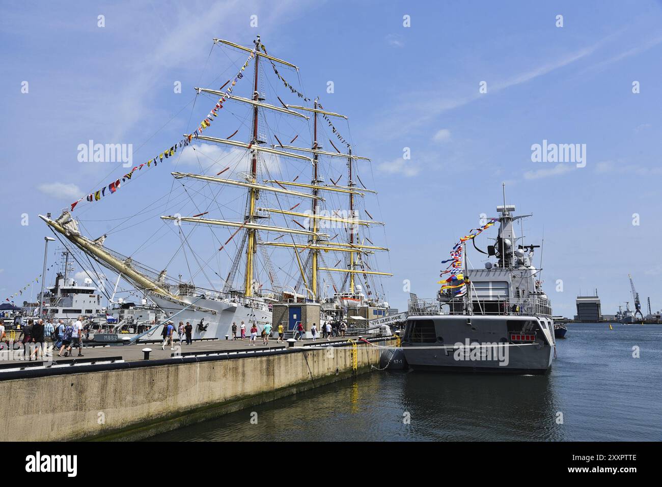 Den Helder, Netherlands. 30 June 2023. A Polish tall ship and a Dutch frigate at the quay in Den helder during Sail 2023 Stock Photo