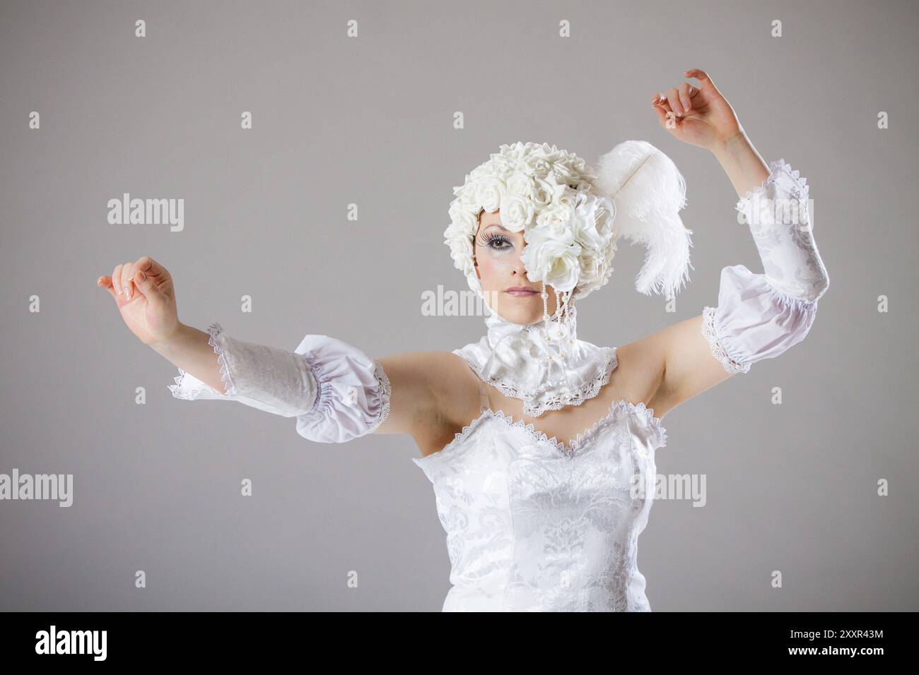 Ballet dancer in a white costume Stock Photo