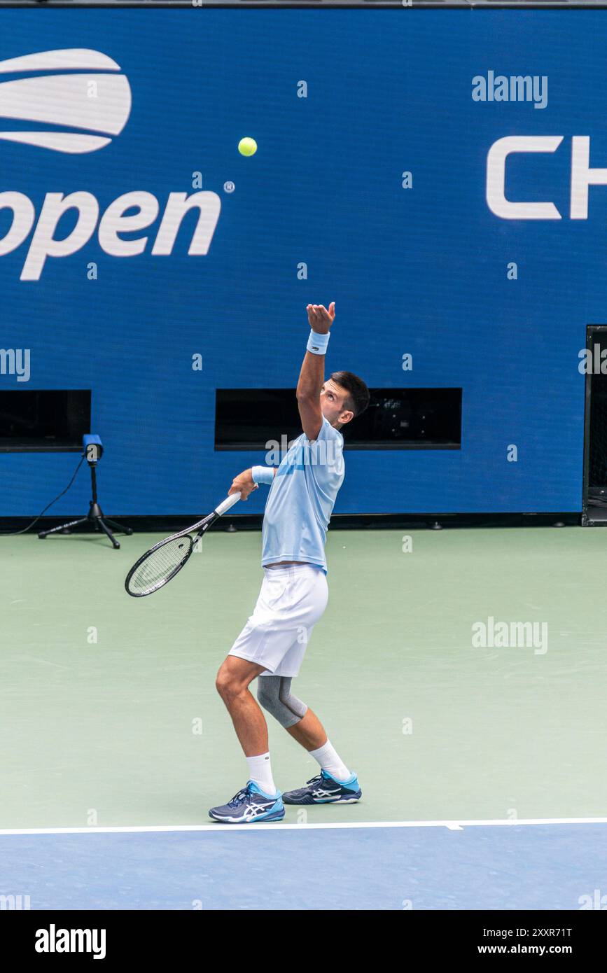 Flushing NY, USA. 24th Aug, 2024. US Open 2024 Arthur Ashe Kids’ Day - Novak Djokovic practice against Stan Wawrinka Stock Photo