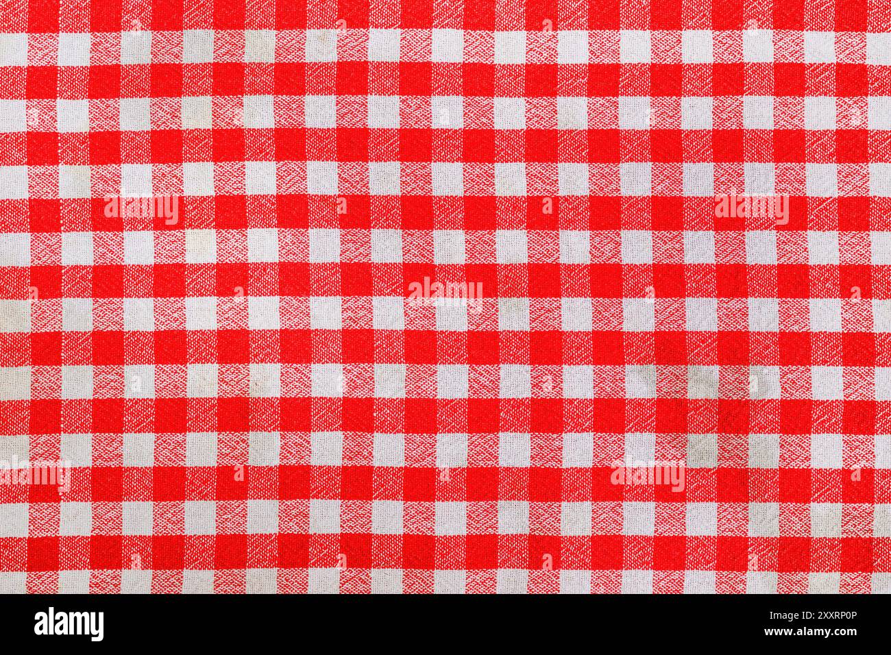 Red and white checkered plaid table cloth as background Stock Photo
