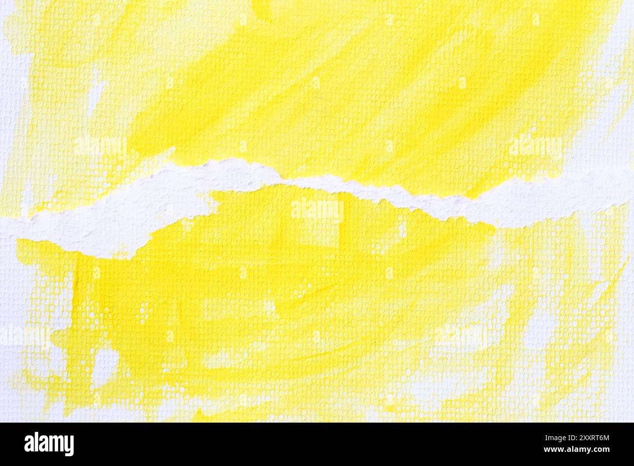 Yellow watercolour paint brush on the white art paper background and ...