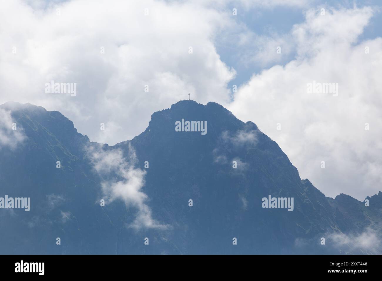 Giewont peak in the clouds in the Tatra Mountains in Poland Stock Photo ...