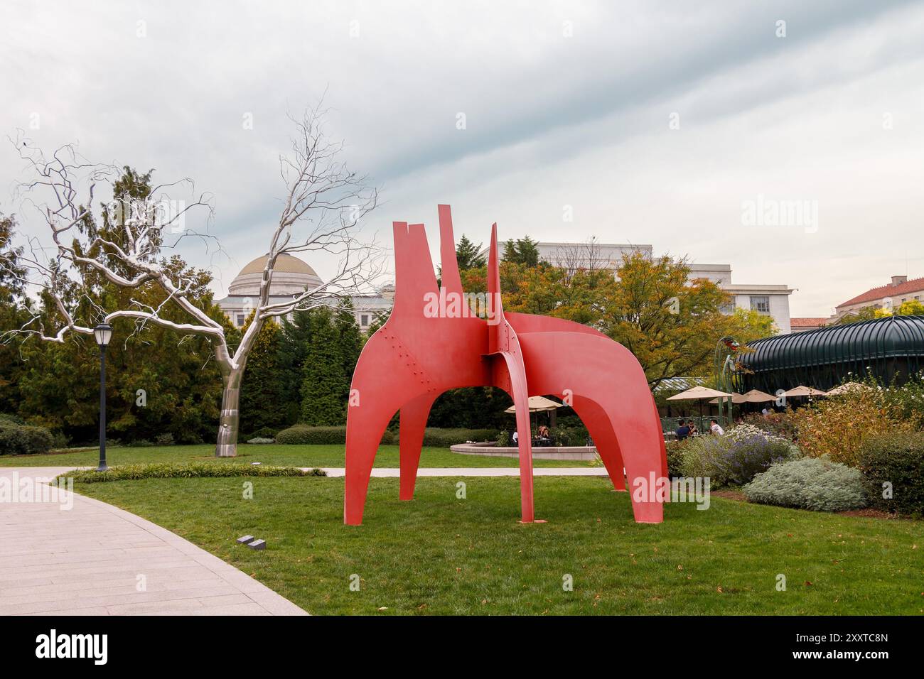 The sculpture garden with a red abstract sculpture in the National ...