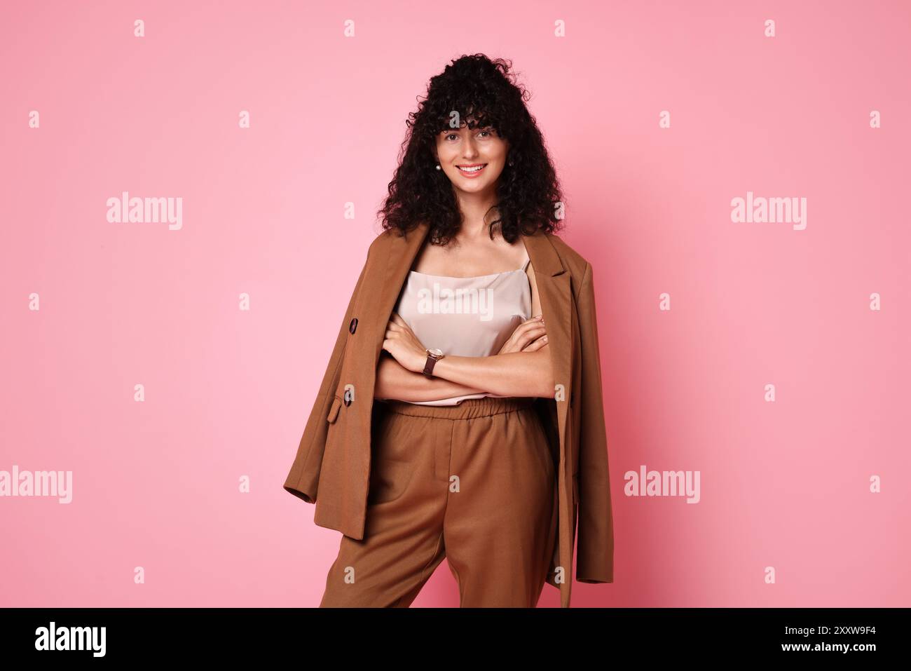 Young woman in pink suit hi-res stock photography and images - Alamy