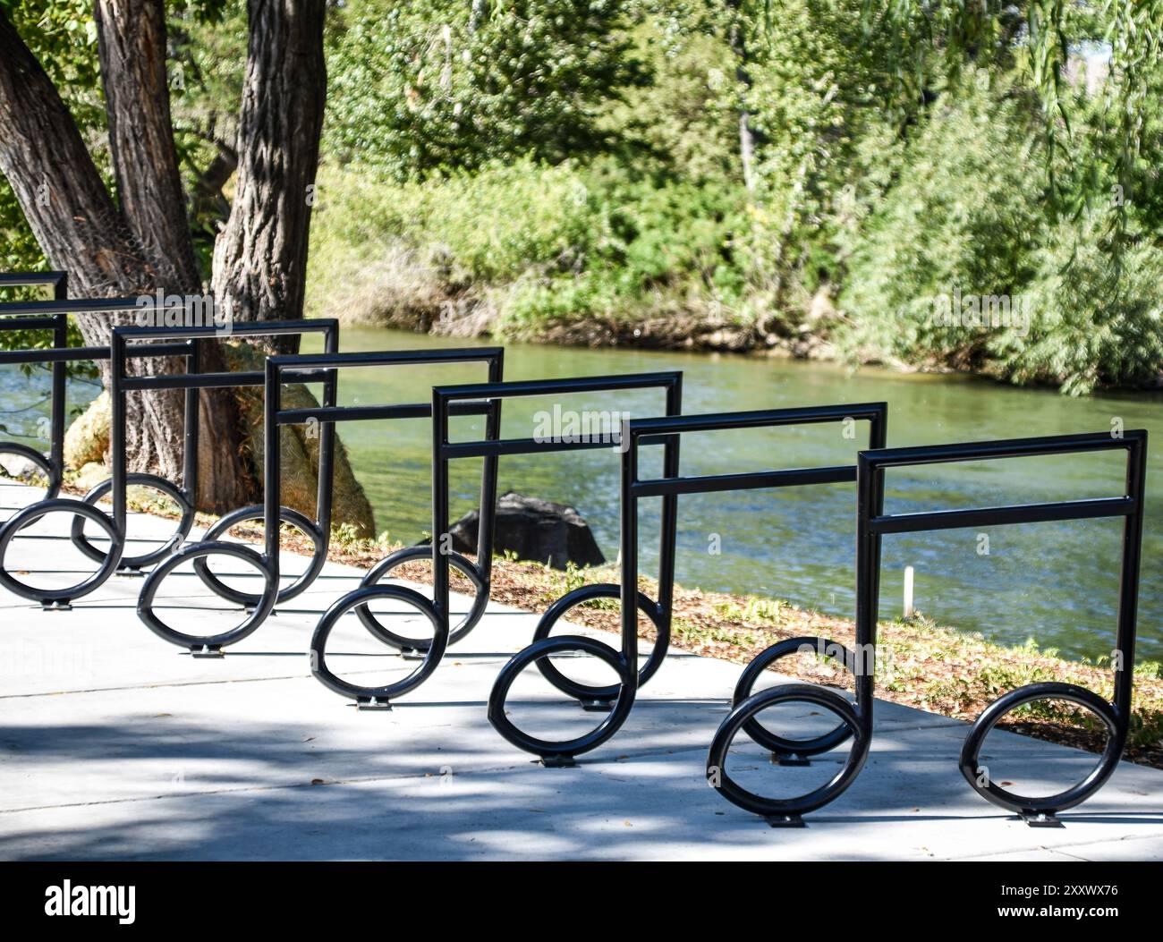 Musical notes bike rack along Boise River in Boise Idaho. The bike rack is on the Greenbelt Park, a linear park that stretches for 25 miles along the Stock Photo