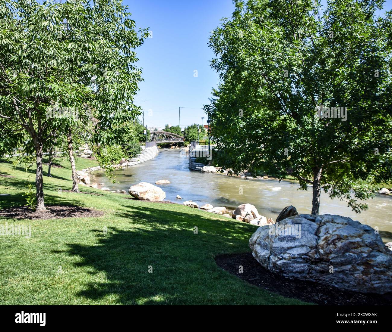 Scenic waterway through downtown Caldwell, Idaho. Forty years ago, this waterway was mostly covered over and was virtually a sewer. Now it is the cent Stock Photo