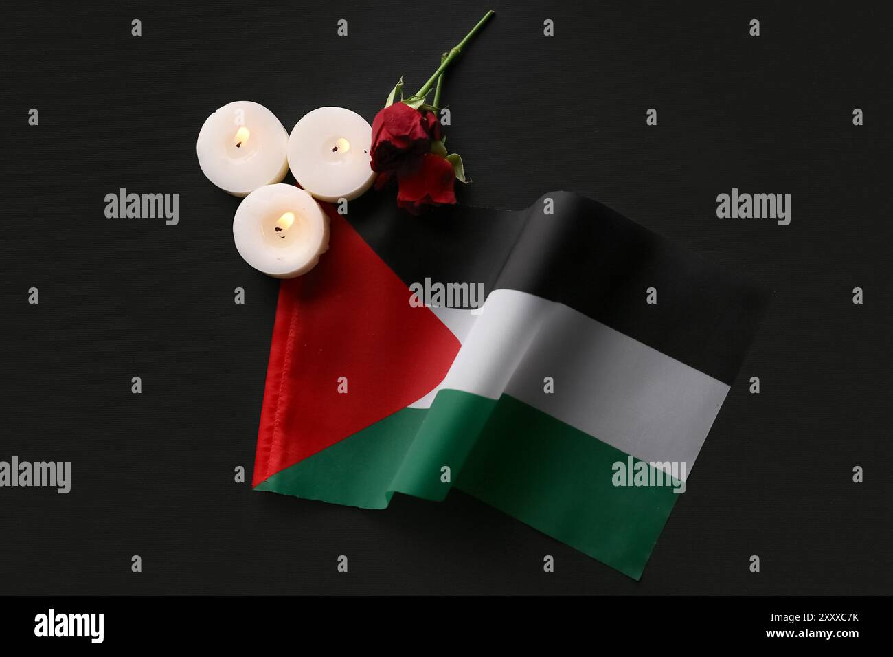 Palestinian Roses Flag of Palestine, rose flowers and burning candles on black background ...