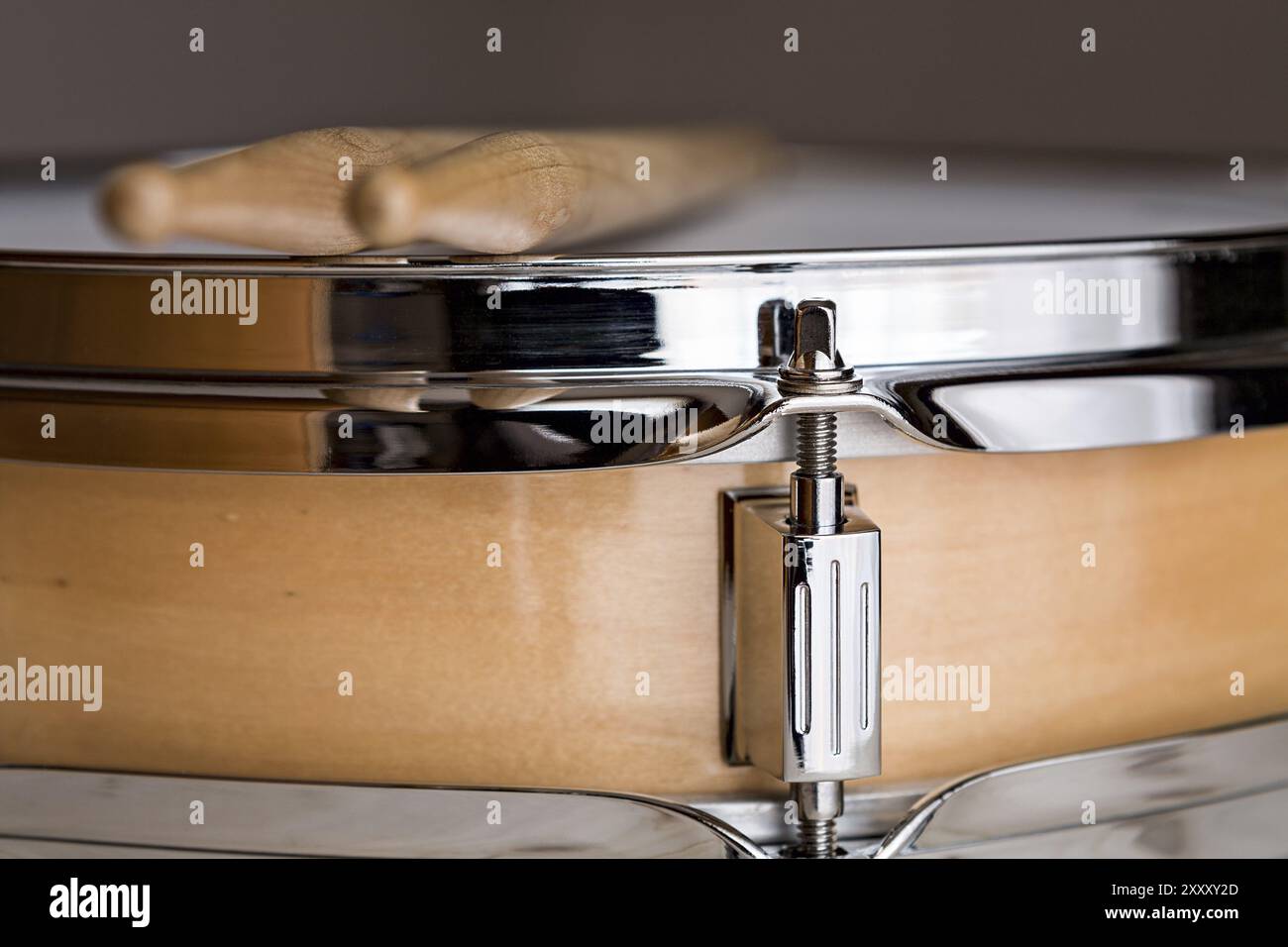 Close up of a wooden snare drum with drumsticks above Stock Photo - Alamy