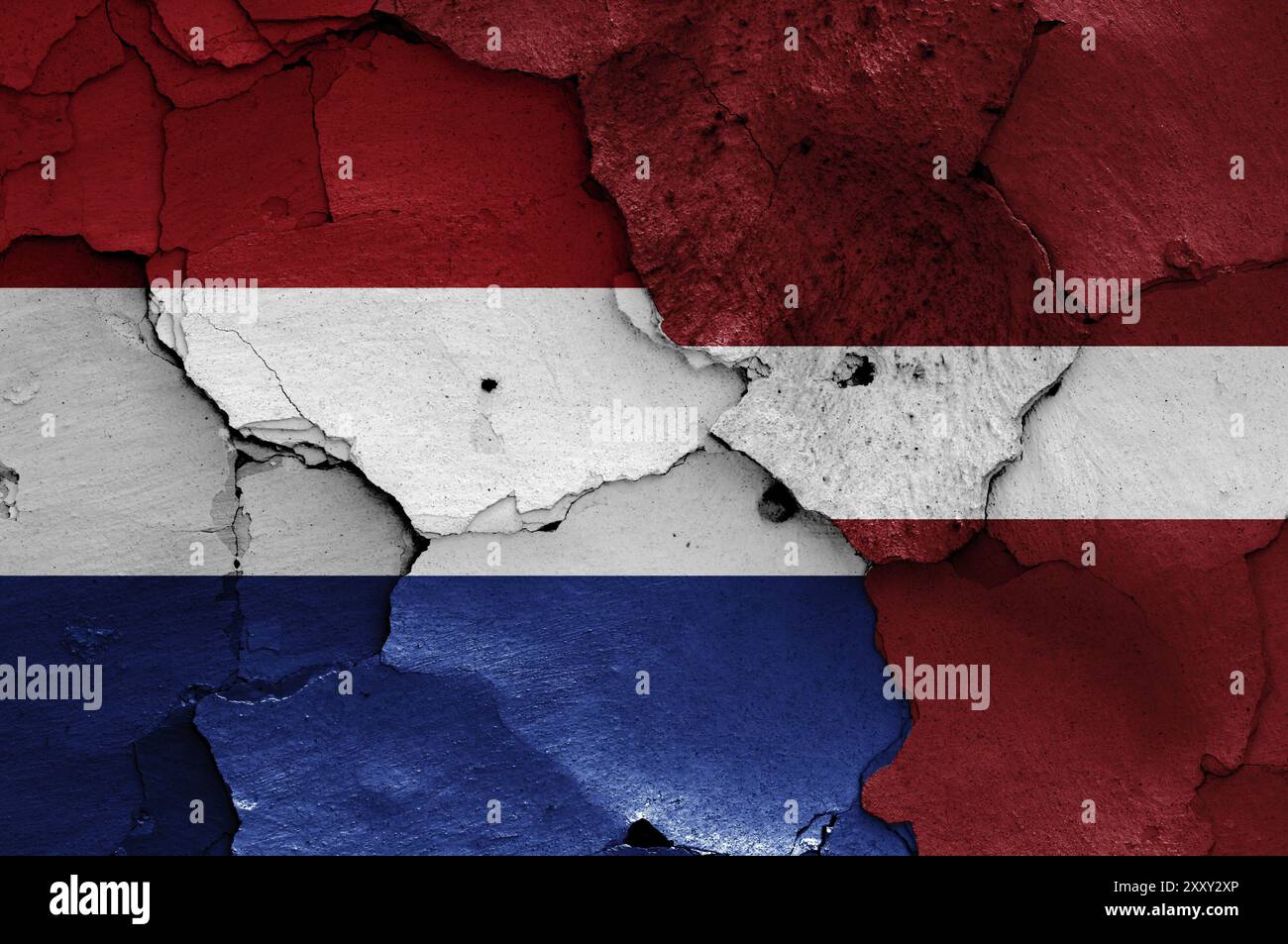 Flags of Netherlands and Latvia painted on cracked wall Stock Photo - Alamy