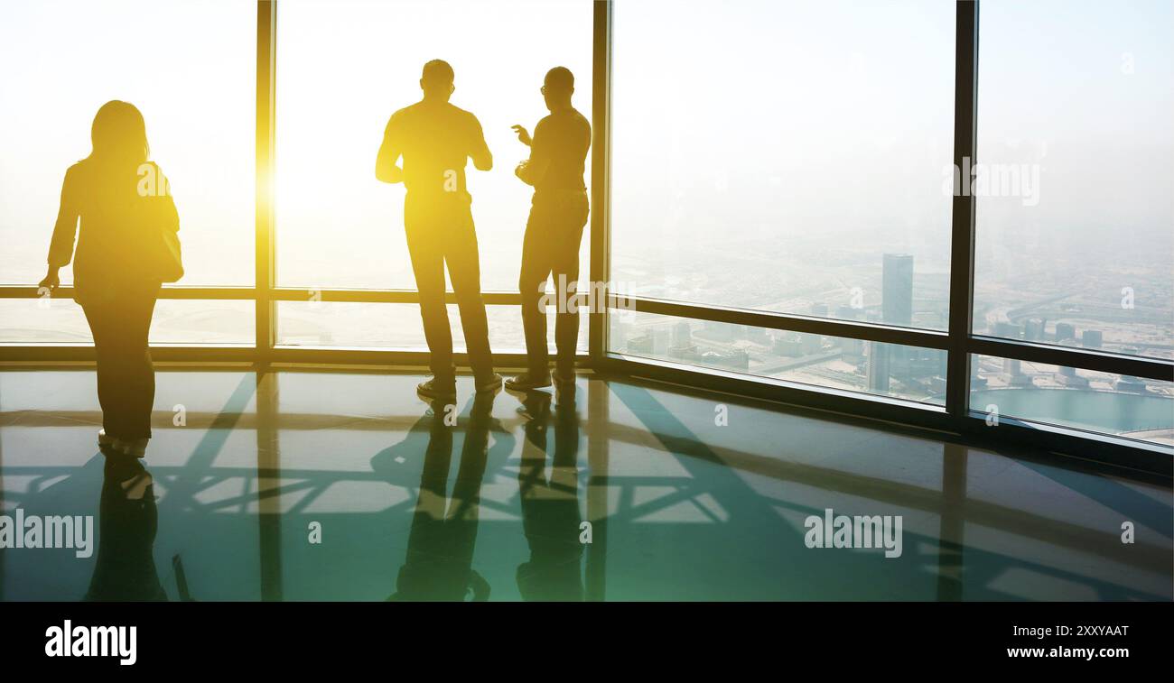 Group of Business People Working in the Office. Silhouette Stock Photo ...